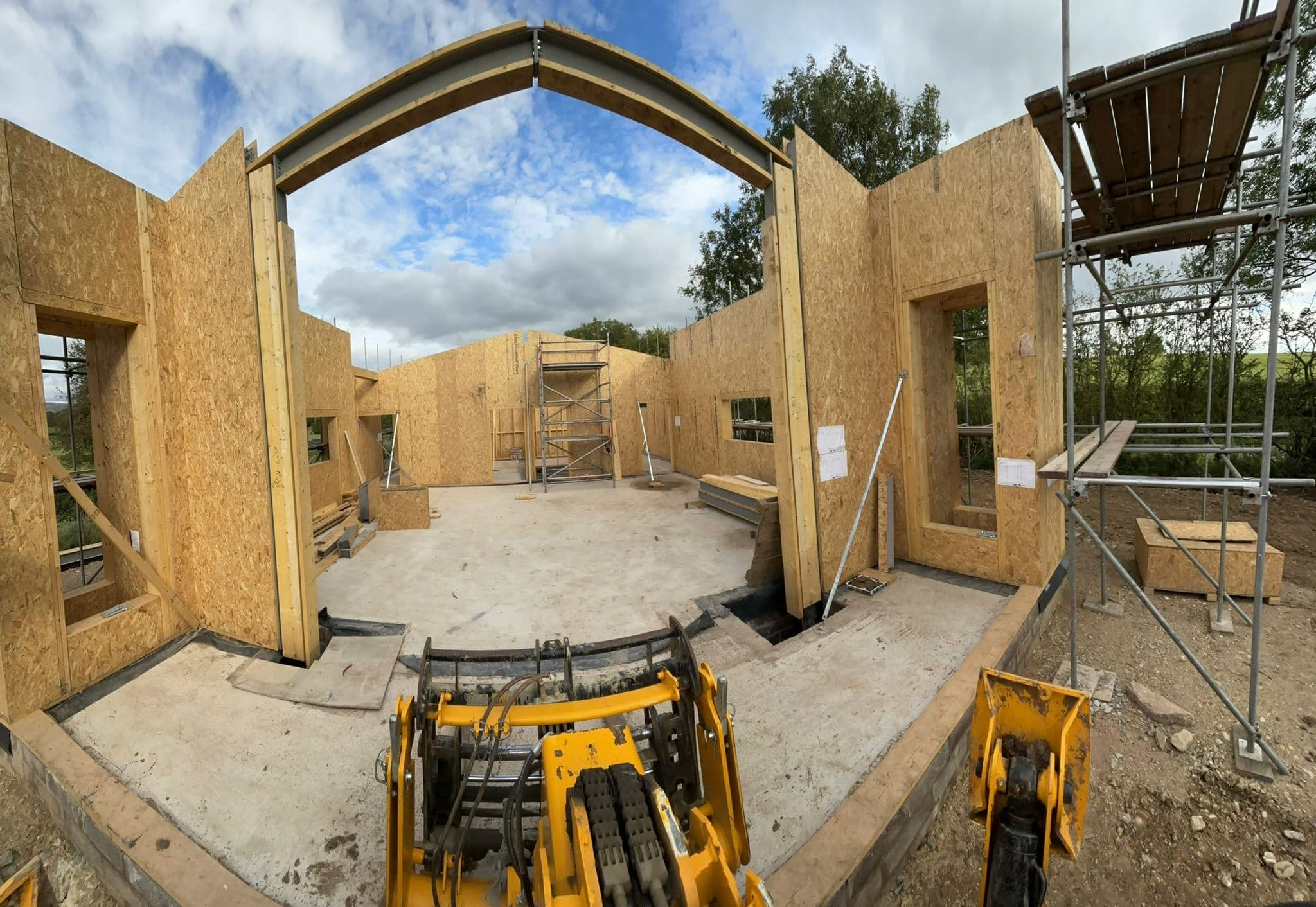 Timber frame building with a vaulted roof structure